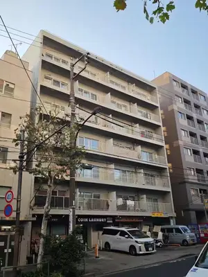 a large building with cars parked in front of it at 7th floor 701 with elevator 40 square meters in the port area, close to Tokyo Tower, direct access to Haneda Airport in Tokyo