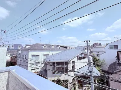 a view of a bunch of buildings and power lines at Yodamari House Ikebukuro Direct access to Shinjuku and Shibuya7 people OK! in Tokyo