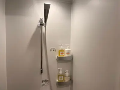 a refrigerator with a bunch of bottles in it at SUNPIKA Tokyo in Tokyo