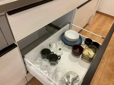 a drawer in a kitchen with dishes and glasses at Skytree Luxury Villa - 2025 New, to Skytree, Direct Airport Access in Tokyo