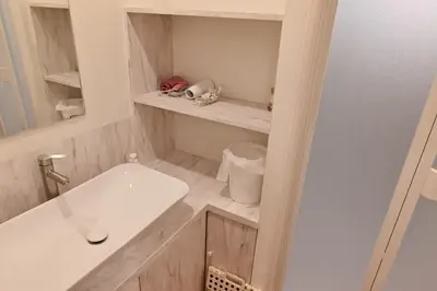 a bathroom with a sink and a white sink at Skytree Luxury Villa - 2025 New, to Skytree, Direct Airport Access in Tokyo