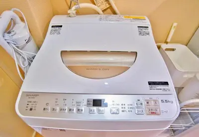 a washing machine is sitting on a shelf at I HOUSE jujo in Tokyo