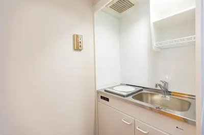 a small kitchen with a sink and a counter top at ksi\u5357\u5e38\u76e4\u53f0402 in Tokyo