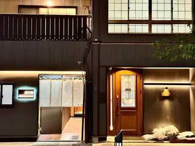 a house with a door and a window and a building at TOKYO SKYTREE HOUSE-Multiple room styles in Tokyo
