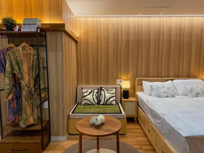 a small room with a bed and a table at TOKYO SKYTREE HOUSE-Multiple room styles in Tokyo
