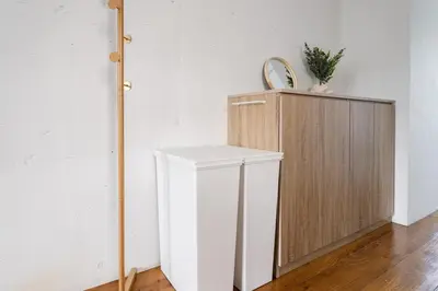 a bathroom with a white cabinet and a mirror at Casa di Luce - Stylish Stay near Shibuya & Meguro River Room405 in Tokyo