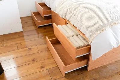 a bedroom with wooden floors and a bed with wooden drawers at Casa di Luce - Stylish Stay near Shibuya & Meguro River Room405 in Tokyo