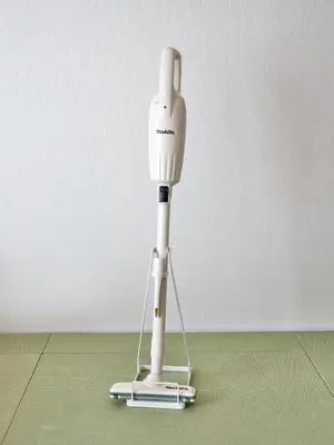 a white robot standing on a green floor at Tokyo Retreat -SUMIDA- in Tokyo