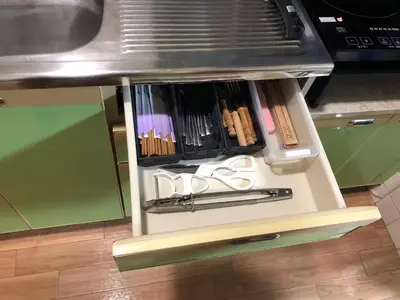 a drawer in a kitchen with utensils at \u65b0\u5bbf\u5f92\u6b69\u570f\u306e\u30db\u30c6\u30eb\u897f\u65b0\u5bbf\u4e94\u4e01\u76ee\u99c52\u5206 in Tokyo