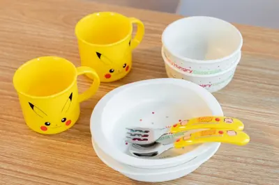 a table with two yellow cups and a plate with a fork at \u548c\u6c23\u4f1a\u3005\u6e0b\u8c37\u672c\u753a Wakiaiai Shibuyahontyo in Tokyo