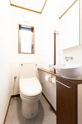 a bathroom with a toilet and a sink at \u548c\u6c23\u4f1a\u3005\u6e0b\u8c37\u672c\u753a Wakiaiai Shibuyahontyo in Tokyo