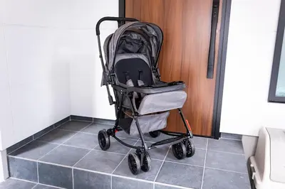 a stroller sitting on a tile floor in a room at Villa Sumida Five in Tokyo