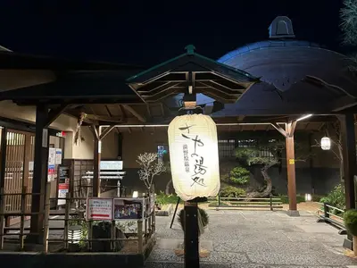 a surfboard on a pole in front of a building at itabashi-ku5 minutes to station 103 in Tokyo