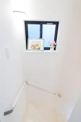 a window in a white room with a picture at MEET IN SKYtree in Tokyo