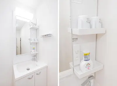 a white bathroom with a sink and a mirror at \u30bf\u30b9\u30ad\u30b9\u30de\u30fc\u30c8\u6c60\u888b\u4e00\u53f7\u9928Tasuki Smart Ikebukuro1 in Tokyo