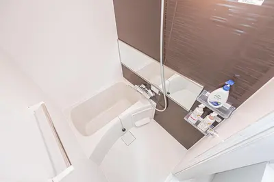 a small bathroom with a sink and a mirror at \u30bf\u30b9\u30ad\u30b9\u30de\u30fc\u30c8\u6c60\u888b\u4e00\u53f7\u9928Tasuki Smart Ikebukuro1 in Tokyo