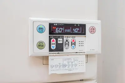 a machine with buttons and controls on a wall at \u30bf\u30b9\u30ad\u30b9\u30de\u30fc\u30c8\u6c60\u888b\u4e00\u53f7\u9928Tasuki Smart Ikebukuro1 in Tokyo