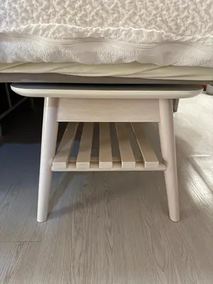 a bed with a mattress on top of a wooden stool at Omori 8min Stylish and comfortable room in Tokyo