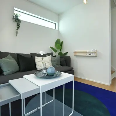 a living room with a couch and a table at SCD155 Spacious Villa in Ikebukuro Suburbs Direct Access to Tokyo's Core Commercial Districts in Tokyo