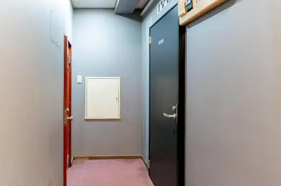 a corridor of an office with a door open at Humming Kinshicho 303-202-301 - Vacation STAY 18969 in Tokyo