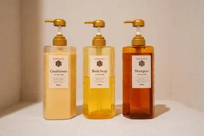 three bottles of soap sitting on a shelf at Humming Kinshicho 303-202-301 - Vacation STAY 18969 in Tokyo