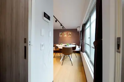 a small dining room with a table in a room at TS Yoyogi by Tranova in Tokyo