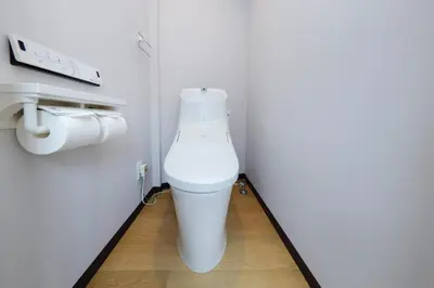 a bathroom with a white toilet in a stall at TS Yoyogi by Tranova in Tokyo