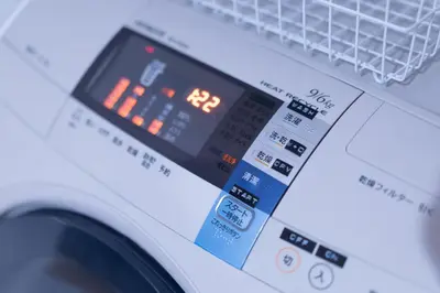 a close up of a washing machine at SATELLITE HOTEL Roppongi 2nd \u30b5\u30c6\u30e9\u30a4\u30c8\u30db\u30c6\u30eb\u516d\u672c\u67282nd in Tokyo