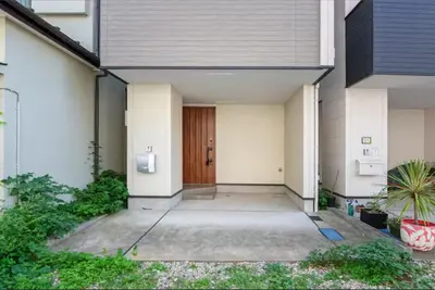 a hallway of a house with a door at \u6e0b\u8c37\u672c\u753a4\u4e01\u76ee in Tokyo