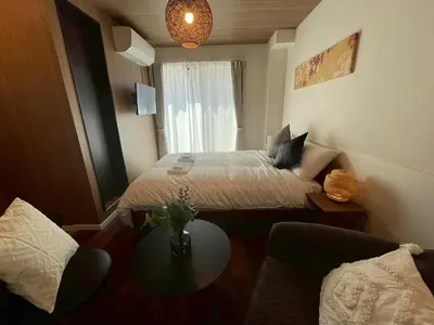 a small room with a bed and a table at OPEN SALE! Stylish Stay near AKIHABARA! May2025 Open! \u79cb\u8449\u539f CORE HOTEL in Tokyo