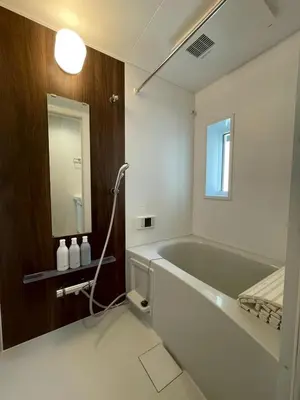 a bathroom with a large tub and a mirror at OPEN SALE! Stylish Stay near AKIHABARA! May2025 Open! \u79cb\u8449\u539f CORE HOTEL in Tokyo