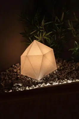 a paper pyramid sitting on top of a pile of rocks at 6-minute walk to Tokyo Skytree Up to 6 people 68 sqm fully renovated direct access to Asakusa, Shibuya, Narita Airport, and Haneda Airport in Tokyo
