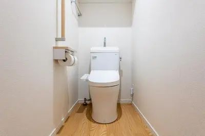 a bathroom with a toilet in a small room at \u304b\u3064\u3089306 in Tokyo