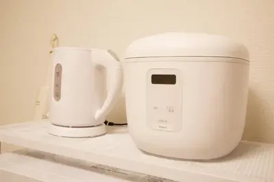 two white appliances sitting on a shelf at \u30b9\u30ab\u30a4\u30d4\u30a2\u9ad8\u7802 201 in Tokyo