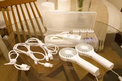 a glass table with a bunch of hair brushes on it at \u30b9\u30ab\u30a4\u30d4\u30a2\u9ad8\u7802 201 in Tokyo