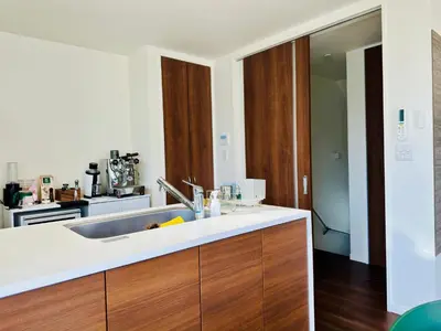 a kitchen with a sink and a stove at Tokyo Designer Guest House in central Tokyo in Tokyo