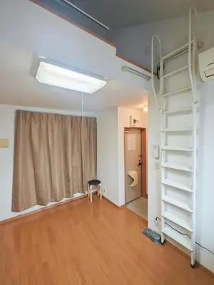 an empty room with a ladder and a room with a toilet at Senju 201, Cozy Tokyo Loft in Tokyo