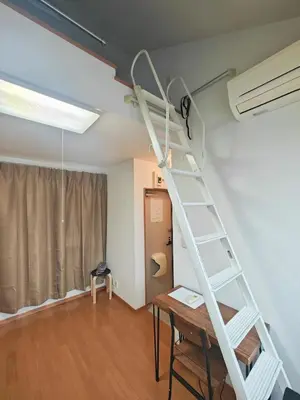 a white ladder is on the wall in a room at Senju 201, Cozy Tokyo Loft in Tokyo