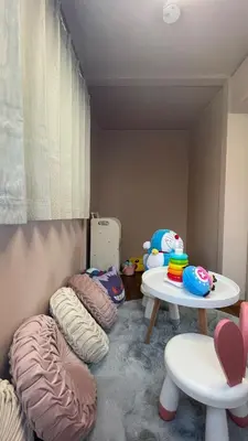 a room with three bean bags and a table at Anime2 in Tokyo