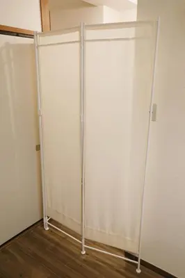 a room with white walls and two poles at \u5bdb\u6c38\u5bfa\u5742\u30cf\u30a4\u30e0 501 in Tokyo