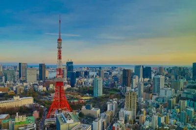 a view of a city with the eiffel tower at \u5bdb\u6c38\u5bfa\u5742\u30cf\u30a4\u30e0 501 in Tokyo
