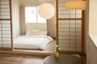 a room with a bed and a table and a mirror at 大田Nishikōjiya hotel-OT0368 in Tokyo