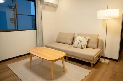 a living room with a couch and a table at 大田Nishikōjiya hotel-OT0368 in Tokyo
