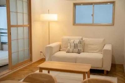 a living room with a white couch and a table at 大田Nishikōjiya hotel-OT0368 in Tokyo