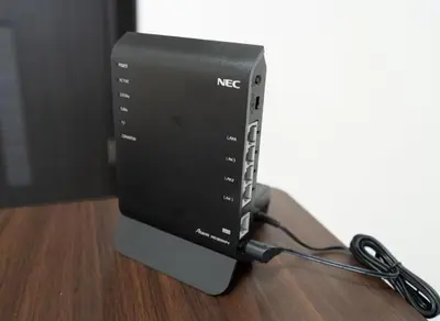 a black computer monitor with a cord plugged into it at Stay in the heart of Shibuya in Tokyo