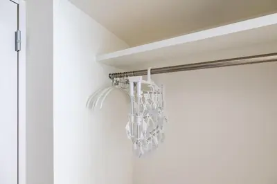 a glass chandelier hanging from a curtain rod at LIVCITY Kinshicho 501 in Tokyo
