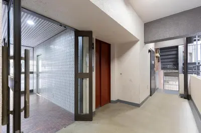 an empty hallway with a door in a building at 3 bedrooms, 5-minute walk to Shinjuku City Center, Isetan department store , max 7 people in Tokyo