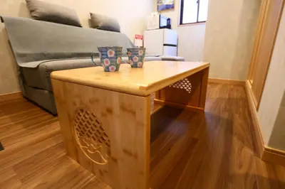 a living room with a coffee table and a couch at New 2BR Ueno Home 2 Minutes Walk to Metro Station in Tokyo