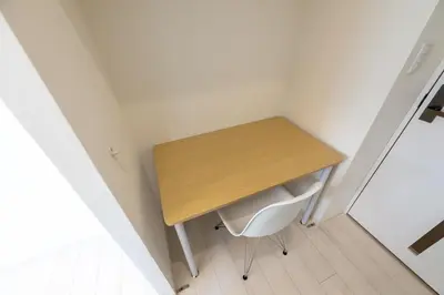 a small desk in a small room with a chair at LIVCITY Kinshicho 802 in Tokyo