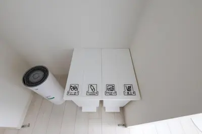 a white room with a radiator and a table at LIVCITY Kinshicho 802 in Tokyo